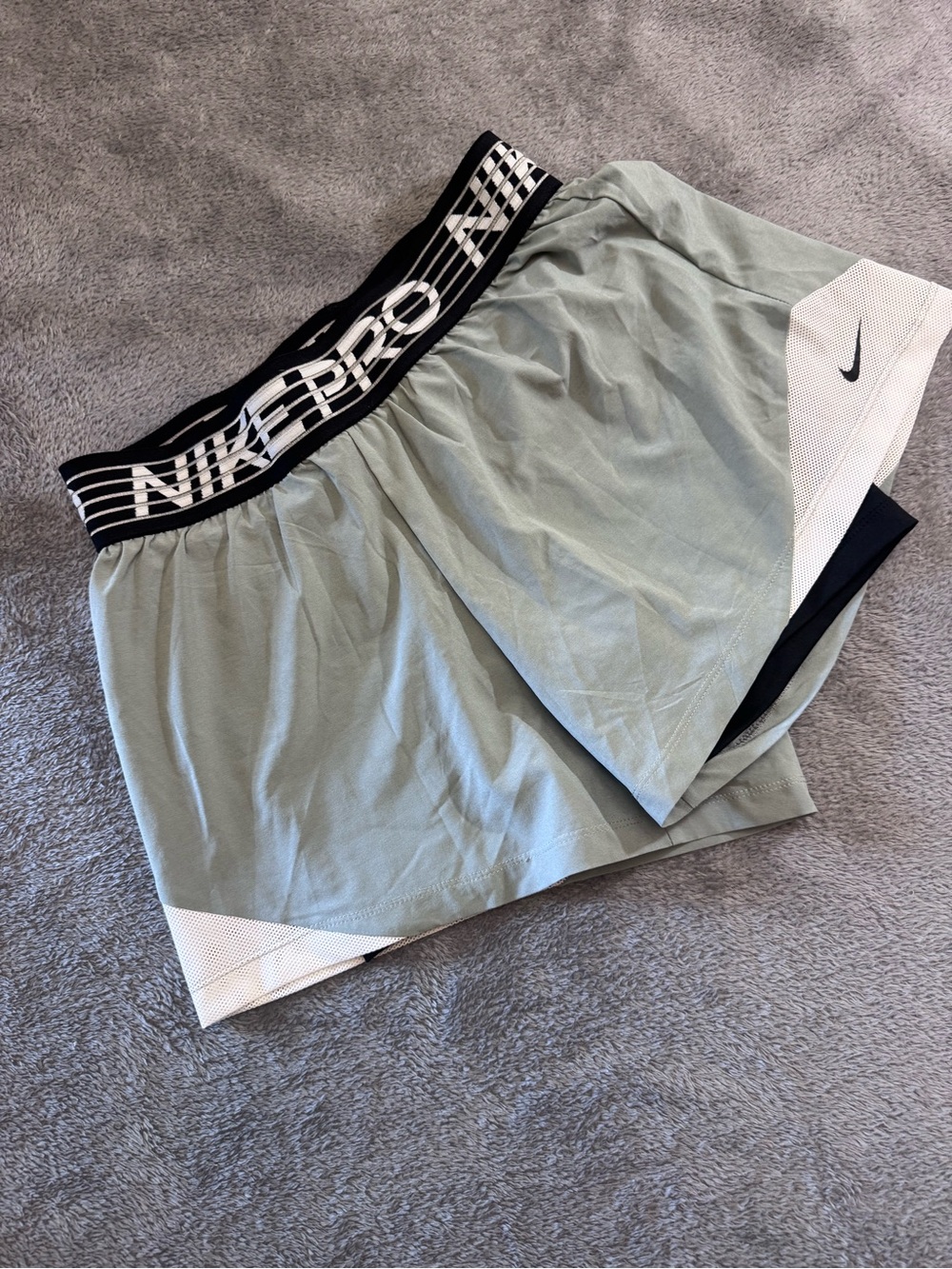 Nike Women’s gray Athletic Shorts with Black Logo Waistband